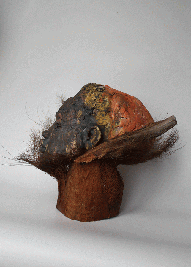 Gwenda-Jones-Sculpture-Interwoven-Worlds-Ceramic-stoneware-sculpture-and-bark-detail. Black portrait